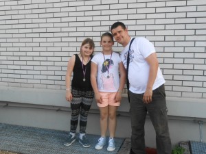 trener Damjan se kiti z madaljami